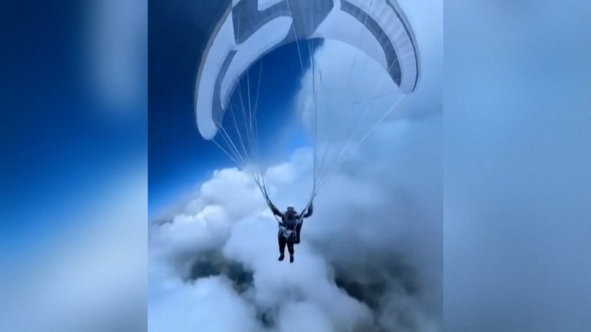 WATCH: Chinese paraglider survives after being lifted into clouds without oxygen