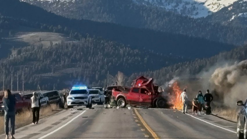 Rescue workers arrive to the scene after a deadly collision between a pickup truck and tour van near Henry’s Lake State Park in eastern Idaho on May 1, 2025.