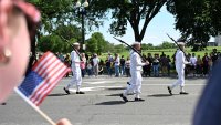 U.S. military members participate in the National Memorial Day Parade on Constitution Avenue