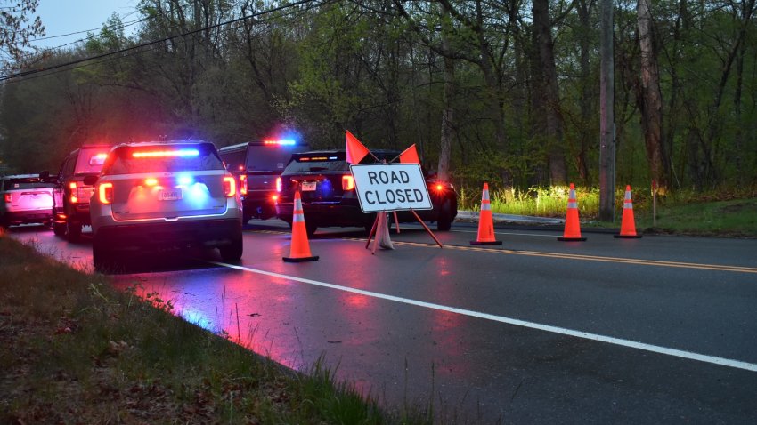 State police on Deep River Road in Colchester.