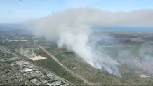 Smoke above Cape Cod as a brush fire burned on Thursday, May 1, 2025.