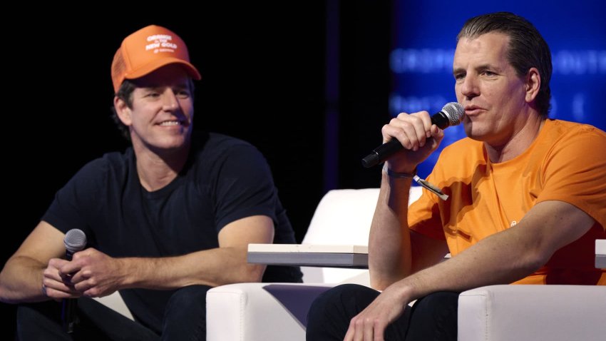 Cameron Winklevoss, co-founder and president of Gemini Trust Co., left, and Tyler Winklevoss, co-founder and chief executive officer of Gemini Trust Co., on stage during the Bitcoin 2025 conference in Las Vegas, Nevada, US, on Tuesday, May 27, 2025.