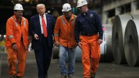 U.S. President Donald Trump walks with North American Flat-Rolled Segment Senior Vice President and Chief Manufacturing Officer Scott Buckiso, Plant manager of Irvin and Fairless Plant Donald German and Mon Valley Works United Steel Corporation Vice President Kurt Barshick, as he visits U.S. Steel Corporation–Irvin Works in West Mifflin, Pennsylvania, U.S., May 30, 2025.