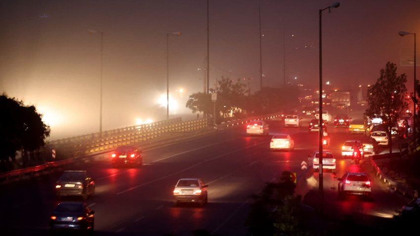 Traffic flows on a highway in the Iranian capital Tehran on June 13, 2025 following reported Israeli strikes targeting Iran early in the morning.