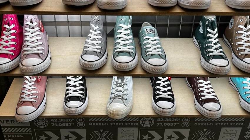 Colorful display of All Star Converse sneakers in shoe store, Manhattan, New York.