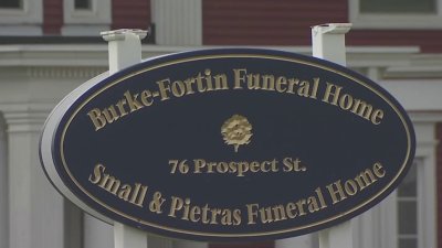 Funeral homeowner accused of embezzling funds pleads not guilty in court