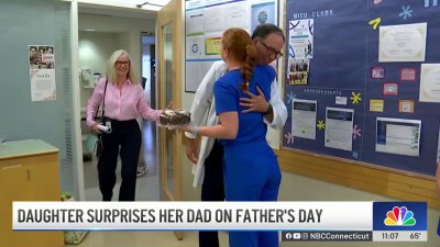 Nurse surprises dad with cake at work on Father's Day