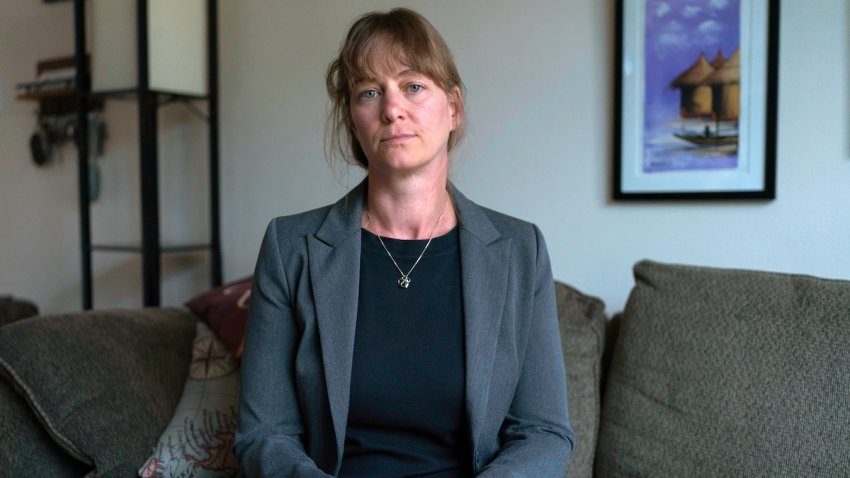 Jenna Norton ,who works as a researcher at the NIH, poses for a photograph during an interview with the Associated Press in Bethesda, Md., Friday, June 6, 2025.