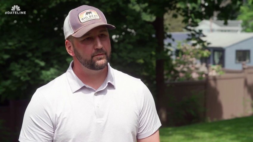 Michael Rroctor speaks in a Dateline interview. He wears a light colored golf shirt and ballcap