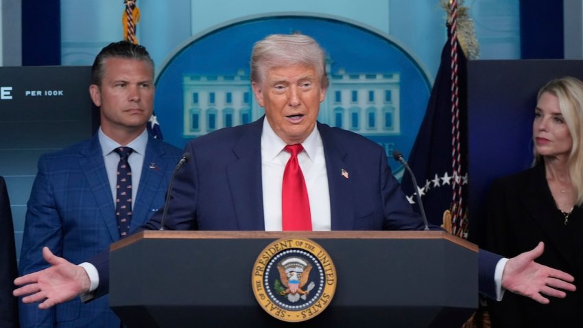 President Donald Trump speaks with reporters in the James Brady Press Briefing Room at the White House, Monday, Aug. 11, 2025, in Washington, as Secretary of Defense Pete Hegseth and Attorney General Pam Bondi, look on. (AP Photo/Alex Brandon)