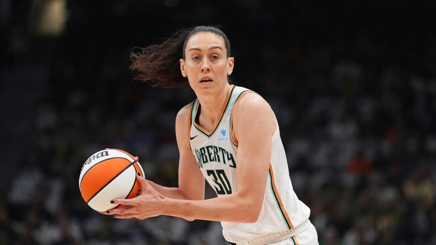 FILE – New York Liberty forward Breanna Stewart holds the ball during a WNBA basketball game against the Seattle Storm, June 22, 2025, in Seattle.