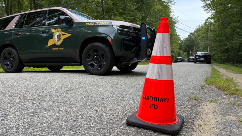 A New Hampshire State Police cruiser seen Tuesday, Aug. 19, 2025, amid an investigation into four deaths in Madbury, New Hampshire,