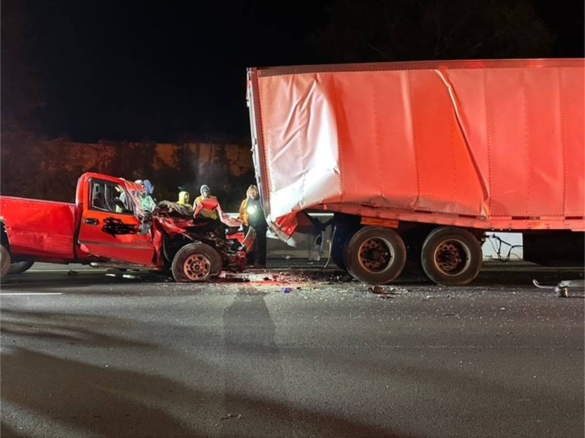 Driver hospitalized after crashing into tractor-trailer at full