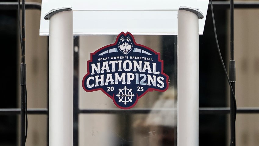 Apr 13, 2025; Hartford, CT, USA;  The podium awaits the arrival of the UConn Huskies Women’s basketball team and guests to celebrate the program’s 12 national title. Mandatory Credit: Scott Rausenberger-Imagn Images