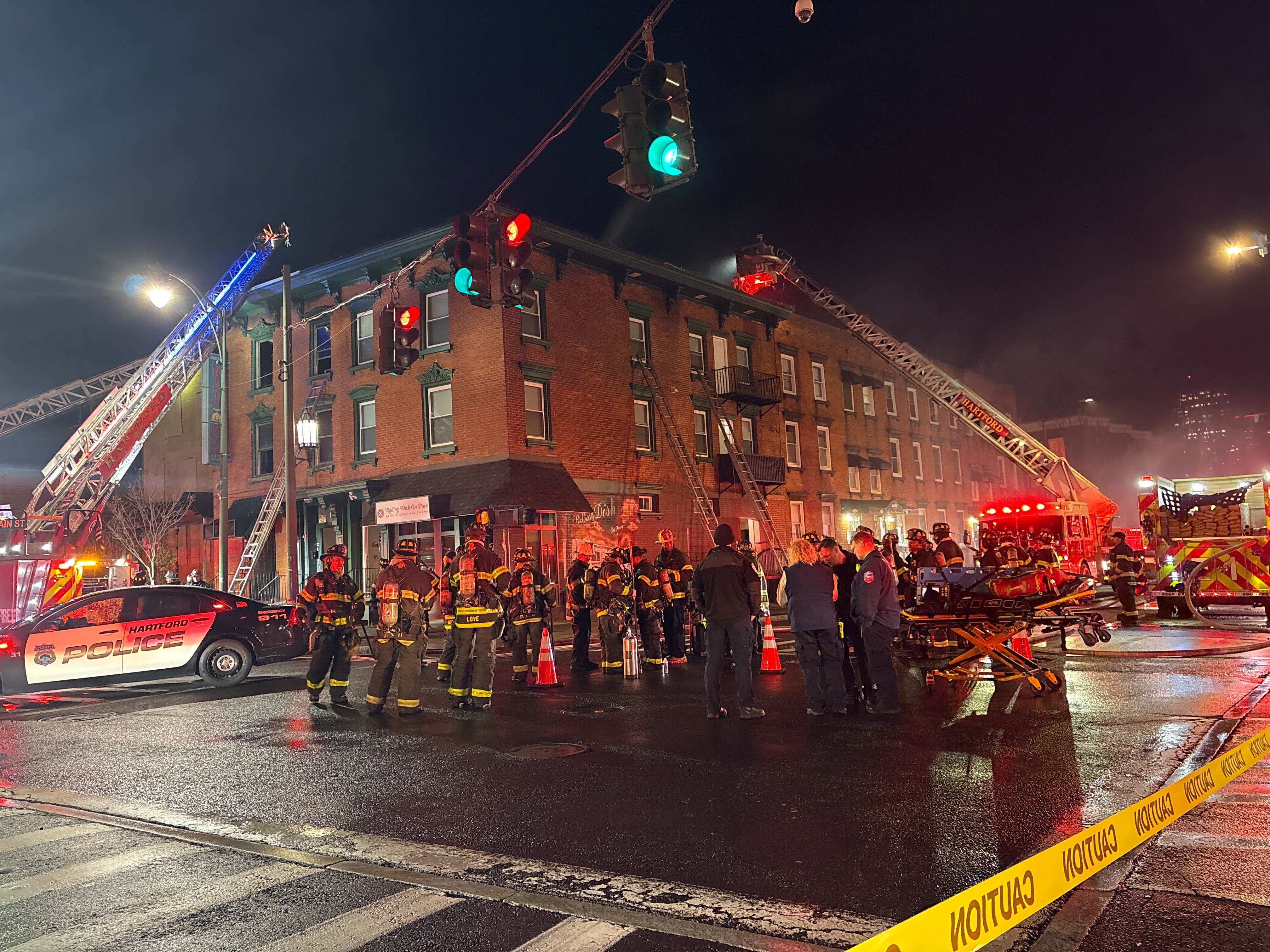 2 firefighters fall through floor while battling 3-alarm fire in Hartford