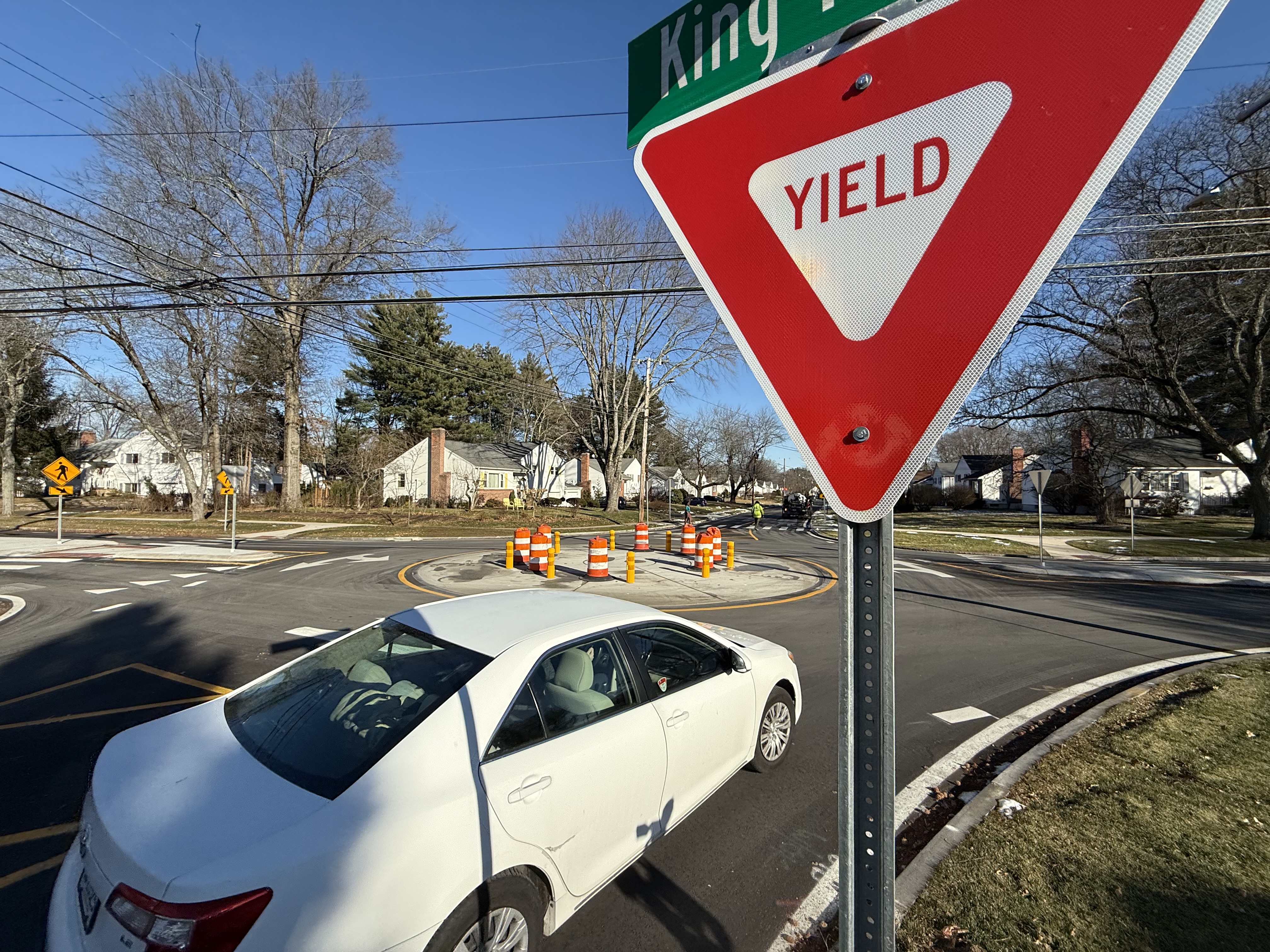 Flexible yellow bollards replacing orange barrels at West Hartford roundabout