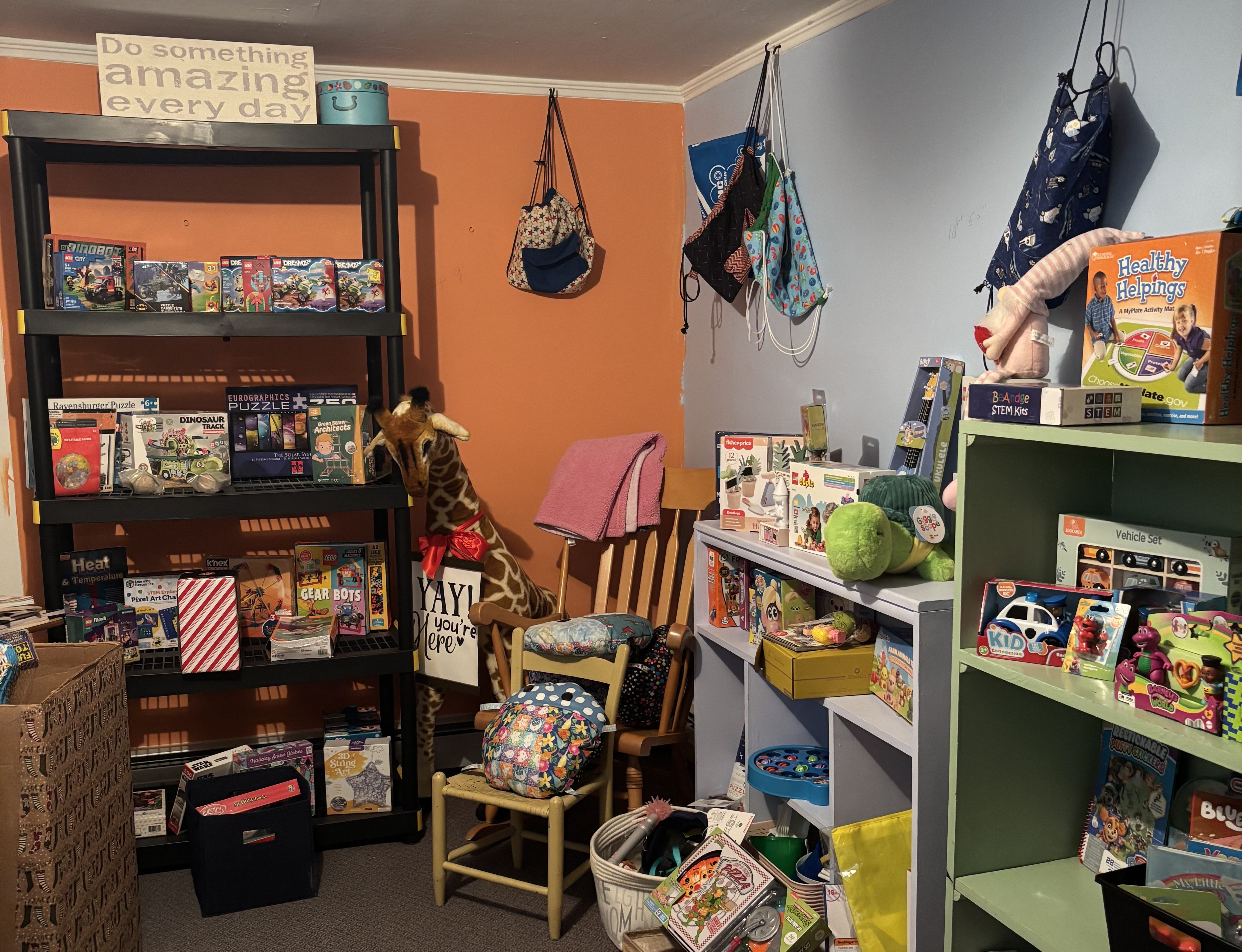 Families shop for Christmas gifts at the Olive Branch, DCF's free toy store