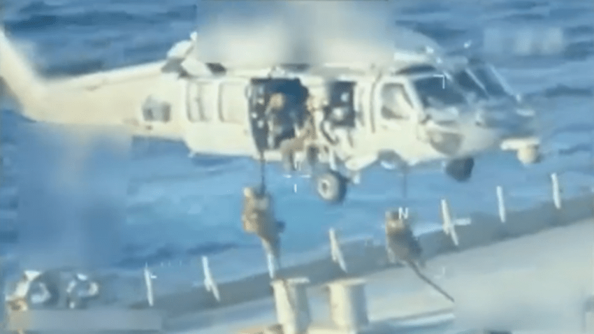 U.S. forces seizing an oil tanker off the coast of Venezuela.