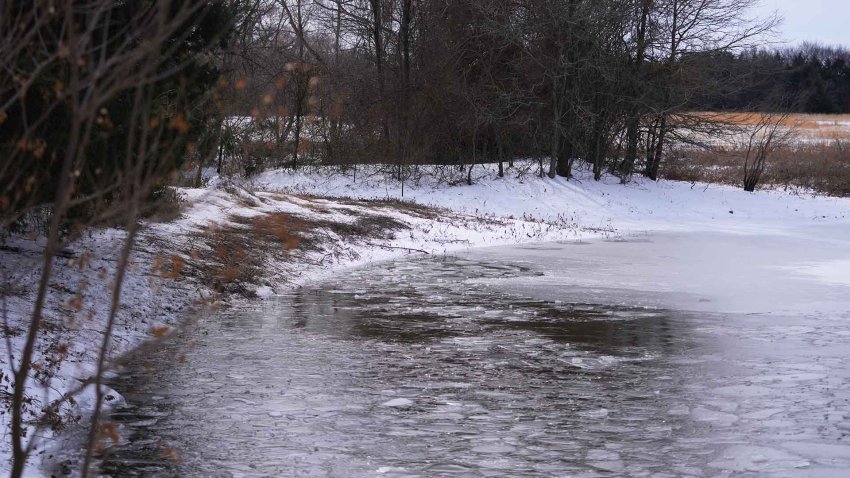 A pond where neighbors say three young boys died after falling into the water is seen Tuesday, Jan. 27, 2026, in Bonham, Texas.