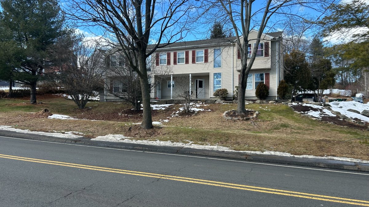 Bullet shot through wall kills person in home next door in Danbury