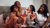 A group of female friends wearing pyjamas, spending the night together in one of their flats in Newcastle upon Tyne, England.
