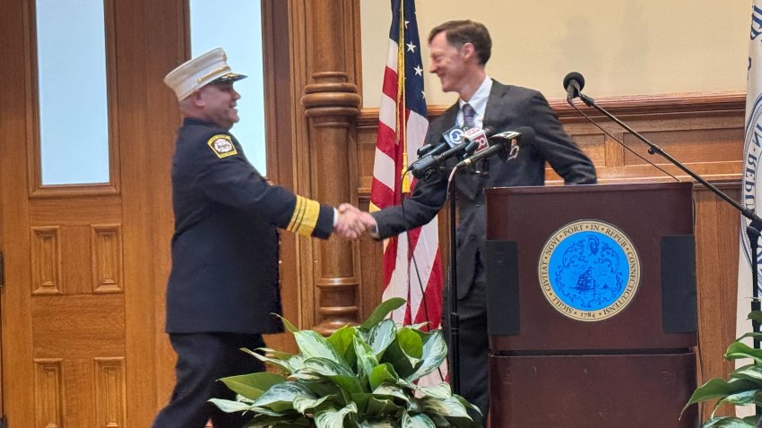 Daniel Coughlin is sworn in as the new chief of the New Haven Fire Department on April 7, 2026.