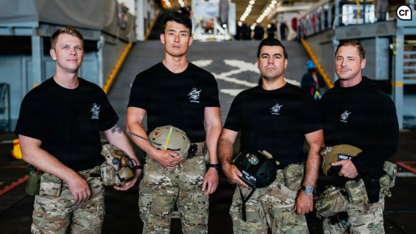 The U.S. Navy dive medical team with Explosive Ordnance Disposal Group ONE (EODGRU-1) pose for a group photo while underway on Amphibious transport dock ship USS John P. Murtha (LPD 26) in the Pacific Ocean, April 9, 2026. John P. Murtha is underway in the U.S. 3rd Fleet area of operations supporting NASA’s Artemis II mission, retrieving the crew and spacecraft following their return to Earth and splashdown in the Pacific Ocean. NASA’s Artemis II mission sent four astronauts on a flight around the moon in the Orion space capsule, marking the first time humans journeyed to deep space in over 50 years.