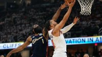 New York Knicks guard Jalen Brunson (11) shoots against Cleveland Cavaliers guard James Harden (1) during the first half of Game 3 in the Eastern Conference finals NBA basketball playoffs series in Cleveland, Monday, May 24, 2027. (AP Photo/Sue Ogrocki)