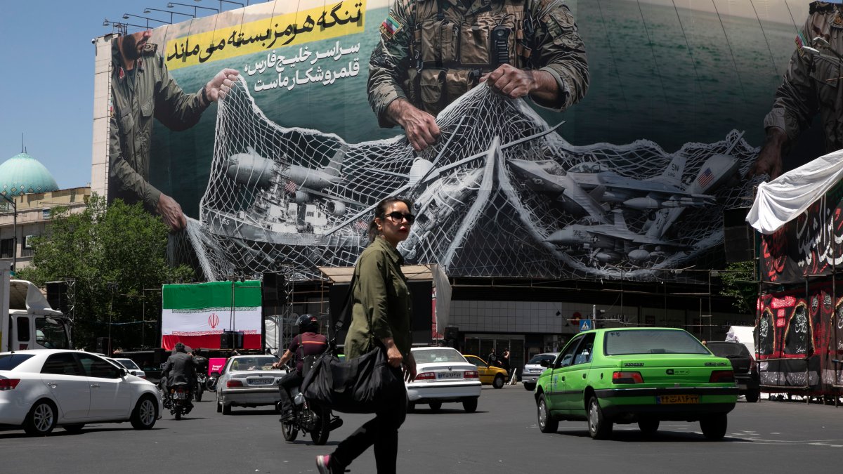 Iran ceasefire tested as cargo ship catches fire and Kuwait reports drone attack