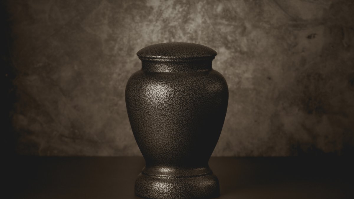Man accused of stealing the ashes of ex-boss' dead daughter, holding them for ransom