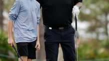 ORLANDO, FLORIDA - DECEMBER 15: Celebrity Carson Day of the United States and his some Jack Daly look on from the third tee during the pro-am prior to the PNC Championship at The Ritz-Carlton Golf Club on December 15, 2023 in Orlando, Florida. (Photo by Mike Mulholland/Getty Images)