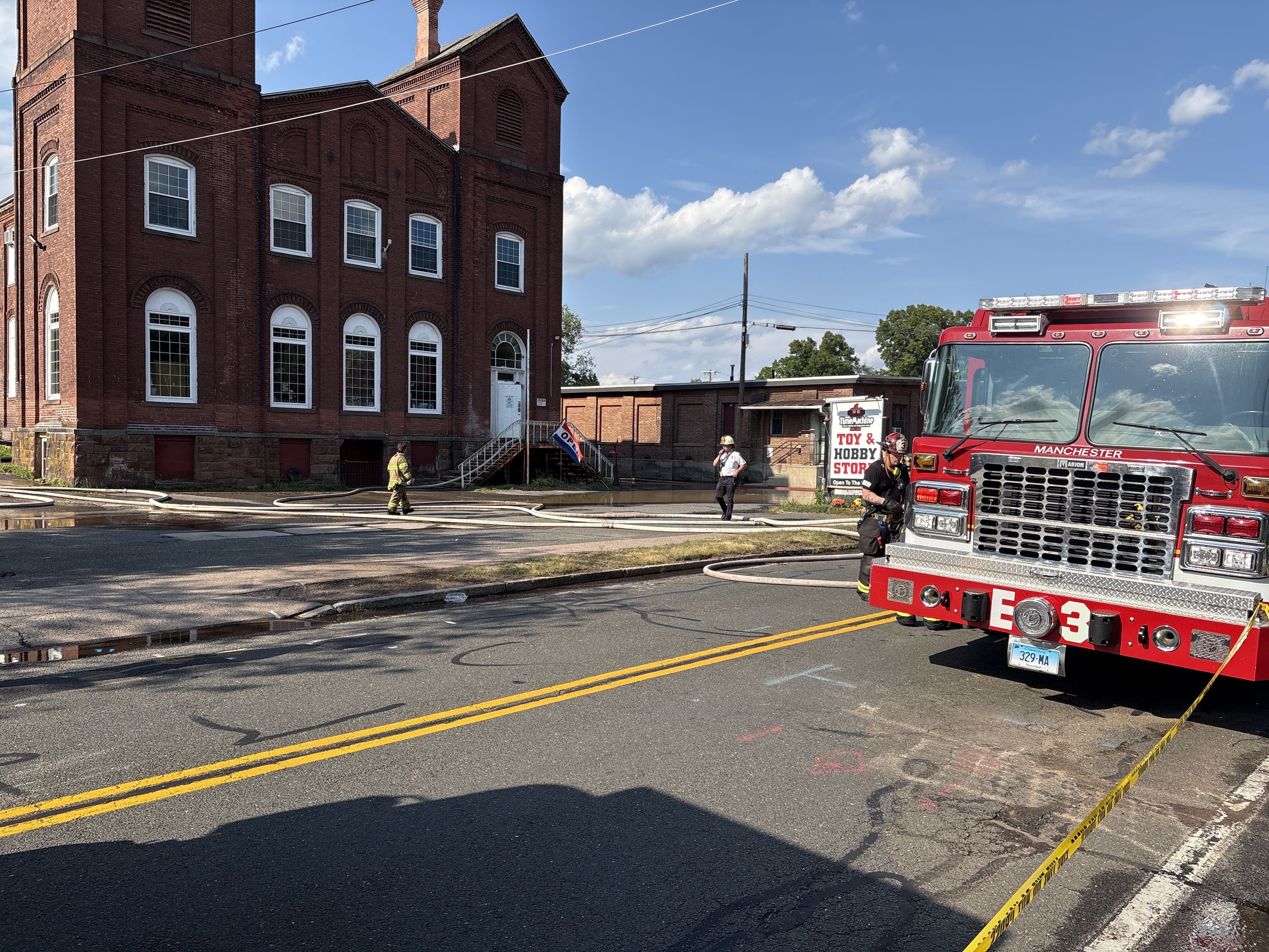 Multiple crews battle 3-alarm fire at Manchester mill building