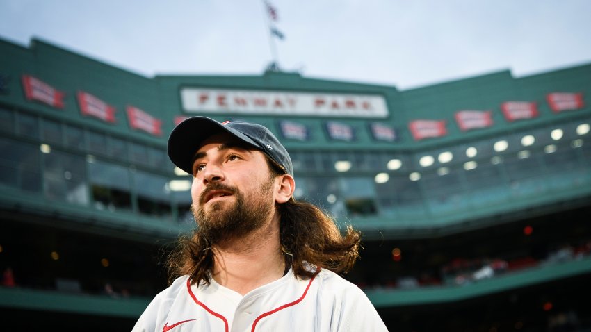 BOSTON, MASSACHUSETTS – APRIL 28: Noah Kahan warms up to throw out the ceremonial first pitch before a game between the Chicago Cubs and the Boston Red Sox at Fenway Park on April 28, 2024 in Boston, Massachusetts. (Photo by Jaiden Tripi/Getty Images)