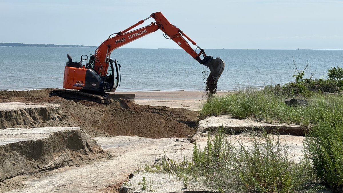 Heavy rain carves deep canyons into West Haven beach