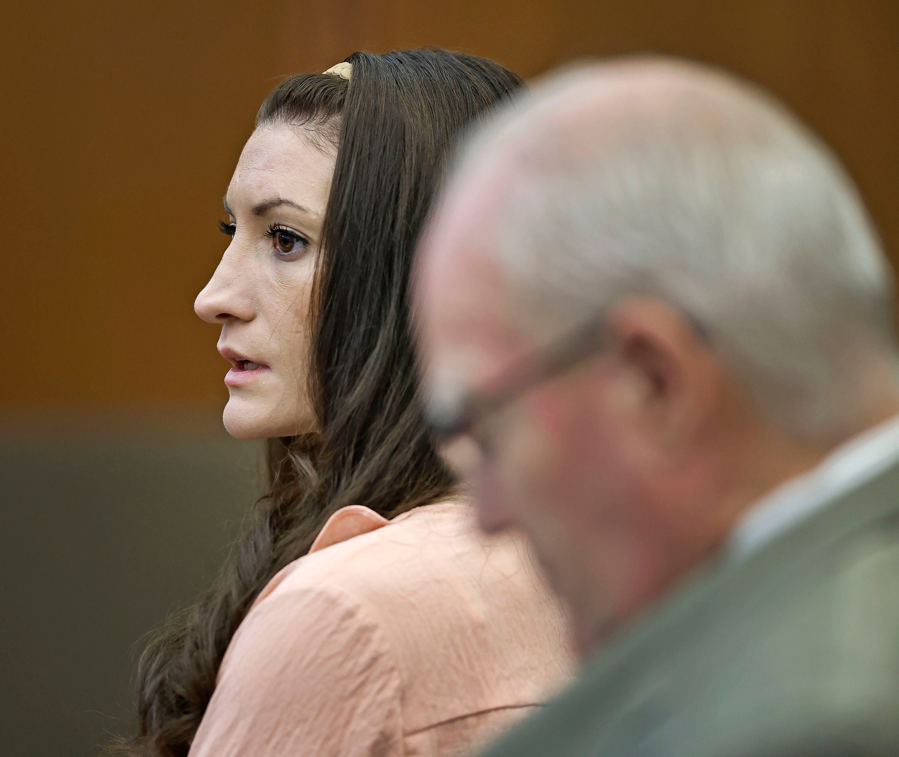 Defendant Lindsay Clancy watches the jury as Judge William Sullivan addresses them at the start of the day in Plymouth Superior Court during her murder trial on Tuesday, Aug. 25, 2026.