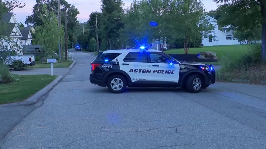 Police investigate after two people were found dead in a home in Acton, Massachusetts.