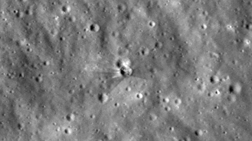 This photo provided by NASA on Tuesday, Aug. 18, 2026, taken by the Lunar Reconnaissance Orbiter, shows a fresh crate...
