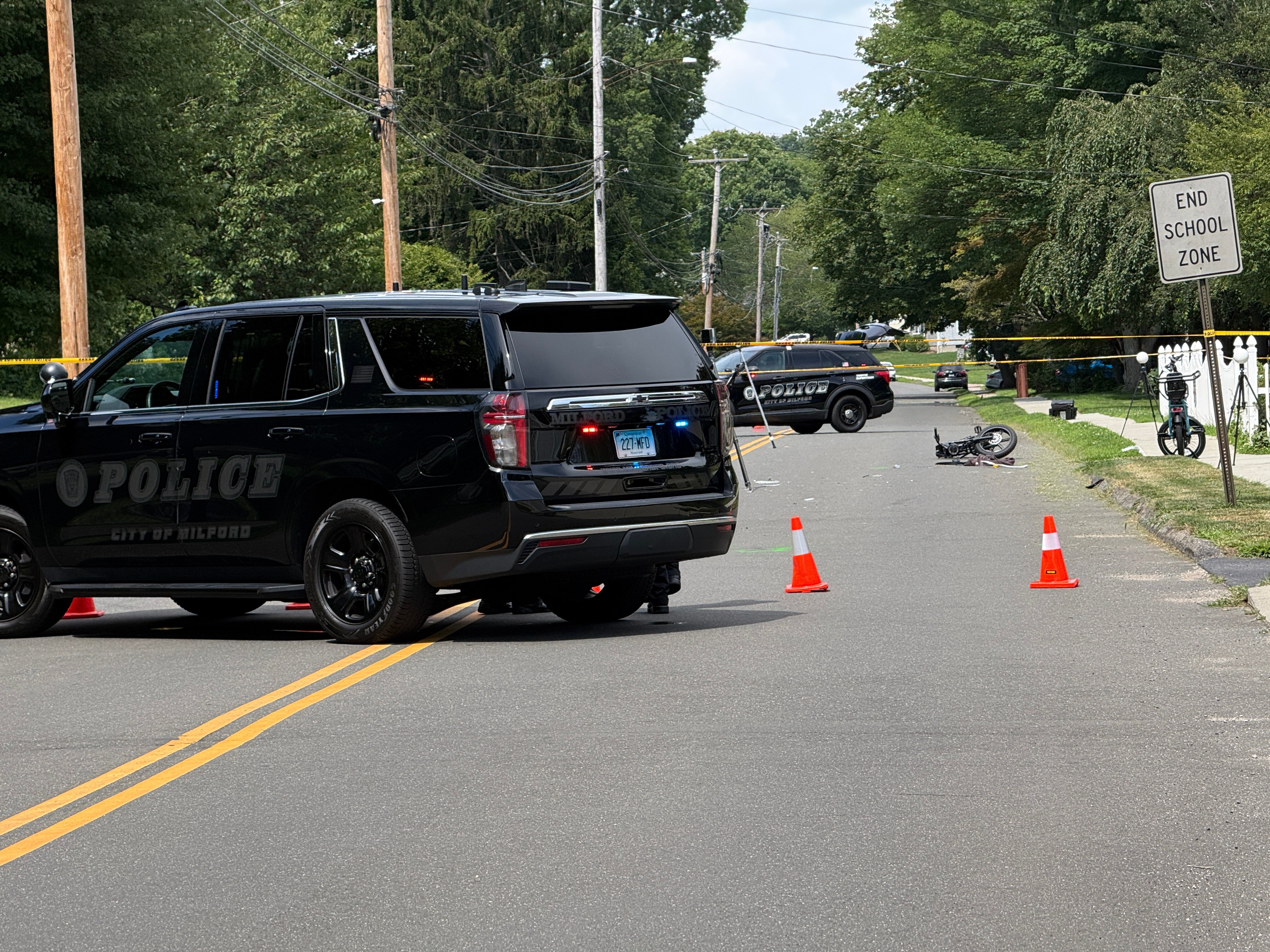 Suspect arrested after 12-year-old on bicycle hit by car in Milford