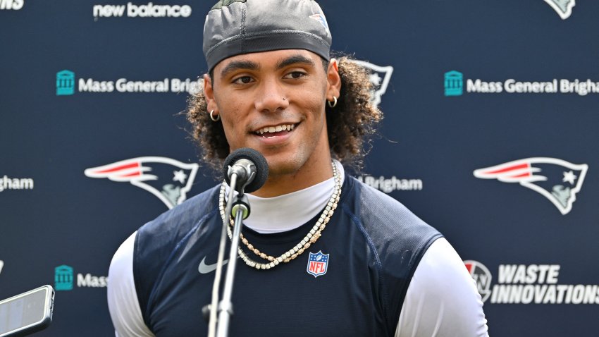 Jul 28, 2026; Foxborough, MA, USA; New England Patriots cornerback Christian Gonzalez (0) speaks to the media after practice at training camp at Gillette Stadium. Mandatory Credit: Eric Canha-Imagn Images