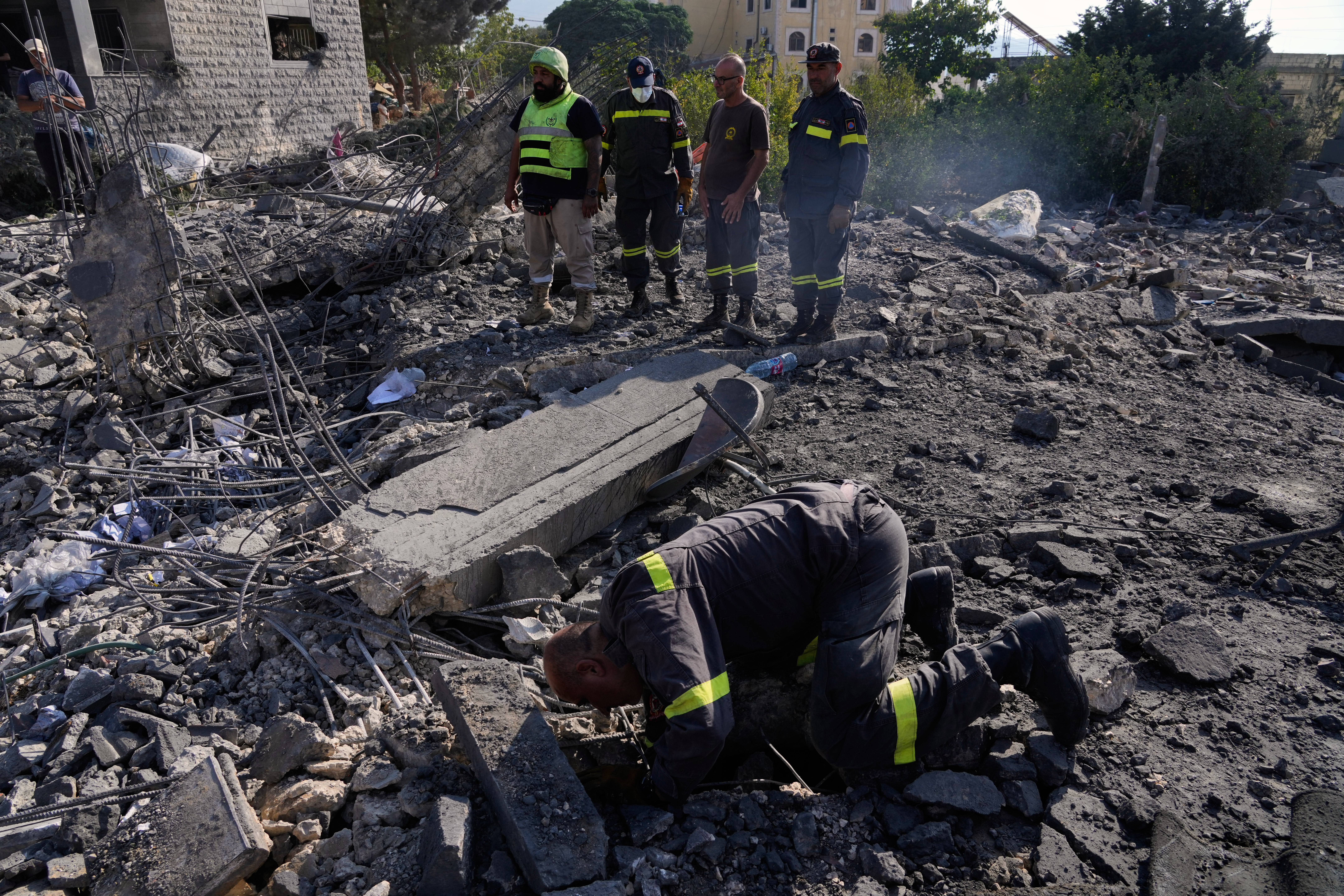 Israel airstrikes on Kfar Rumman kill 12, including two children