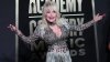 It's officially Dolly Parton Day, with parades, pink lights and book drives