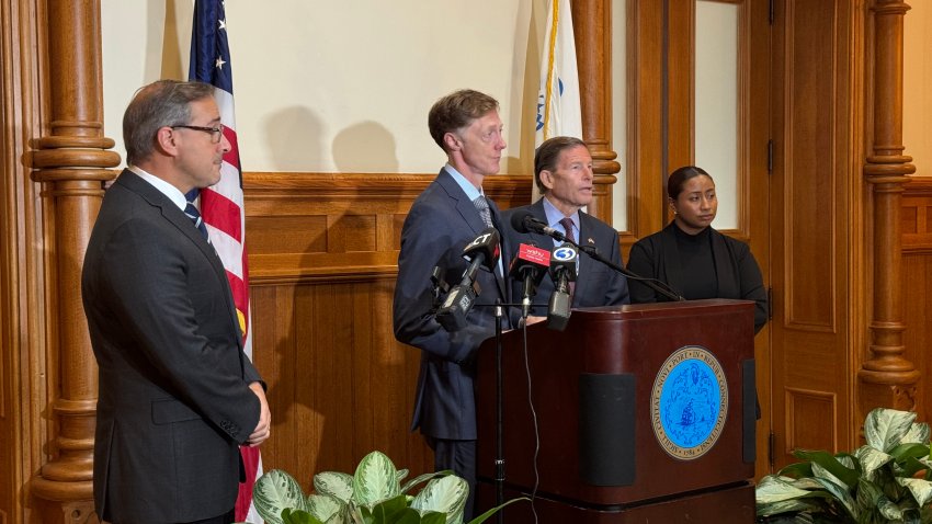 New Haven Mayor Justin Elicker stands next to Senator Richard Blumenthal and attorneys and advocates to demand  accountability and reform from ICE. Sept. 28, 2026