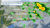 Lingering showers and clouds through a cooler Sunday