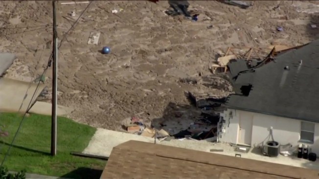 Frightening Florida Sinkhole Swallows 2 Houses 1 Boat