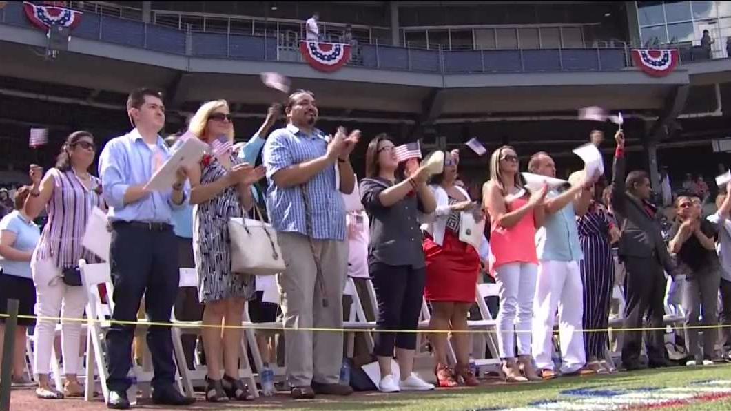 Dozens Become US Citizens at Ceremony at Dunkin' Donuts Park