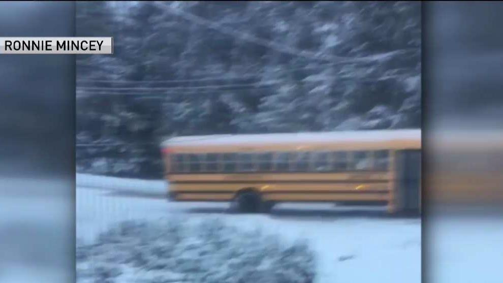 Manchester Bus Gets Stuck in Snow