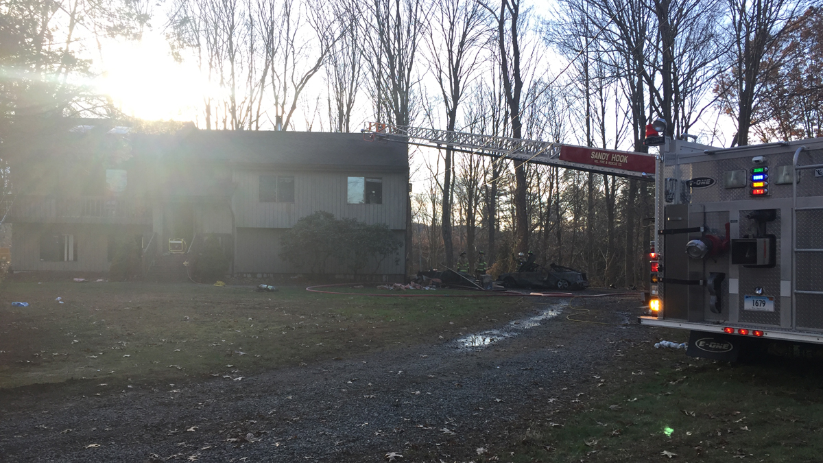 Firefighter Injured Battling Garage Fire in Newtown