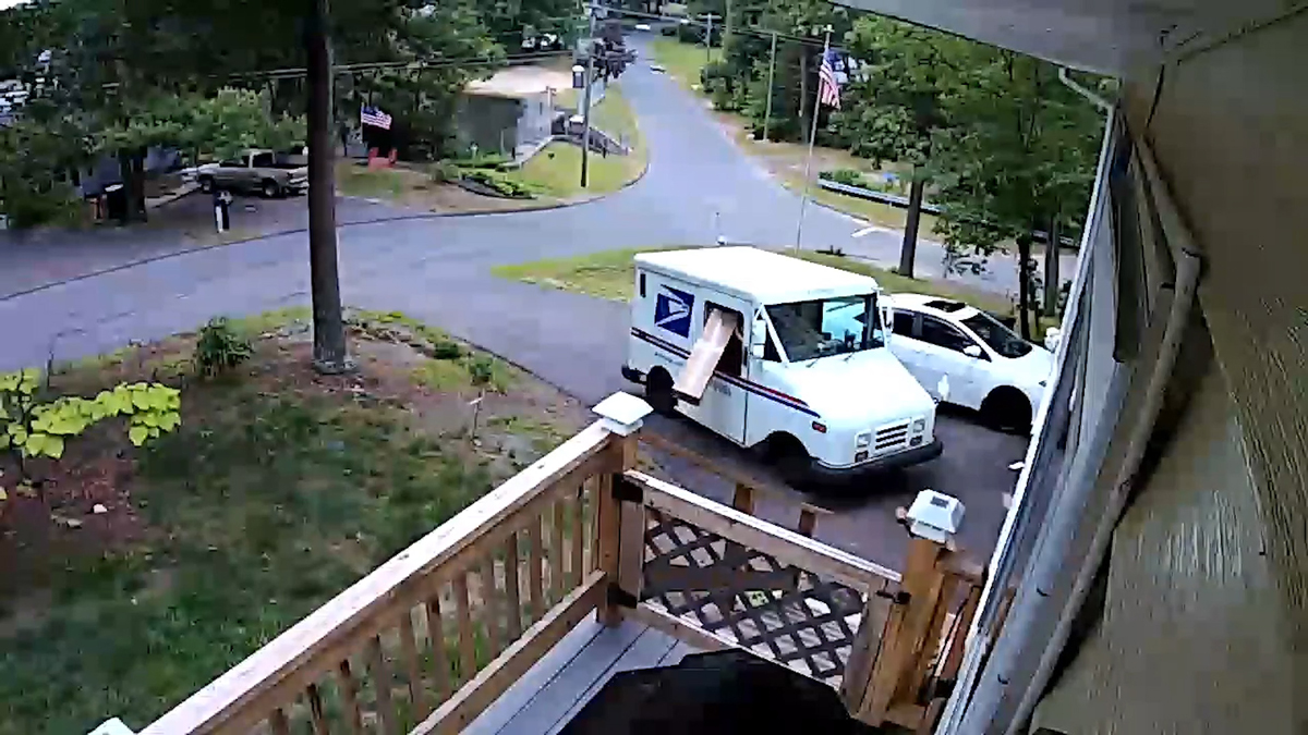 Video Shows Postal Employee Toss Package Out Truck Onto Lawn