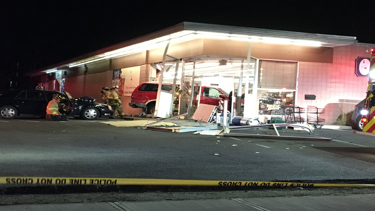 One Injured After Car Crashes Through Milford Building