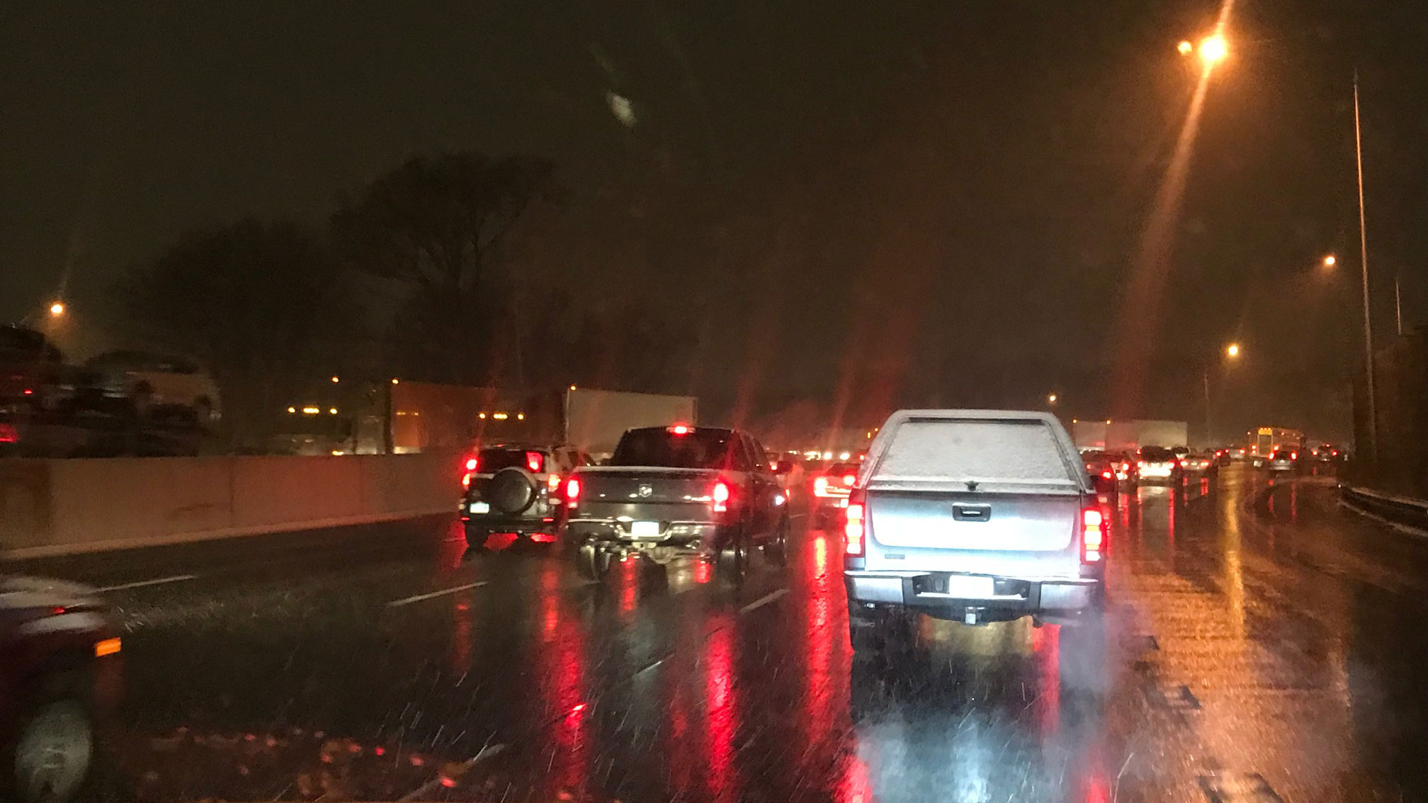 Snow Falling During Evening Commute